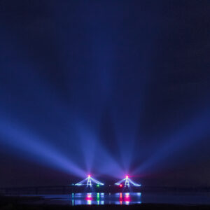 Light Beams Over Water at Night